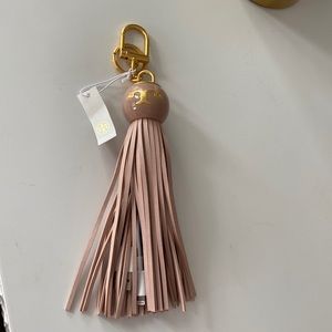 NWT Tory Burch Charger Tassel Key Ring light pink.